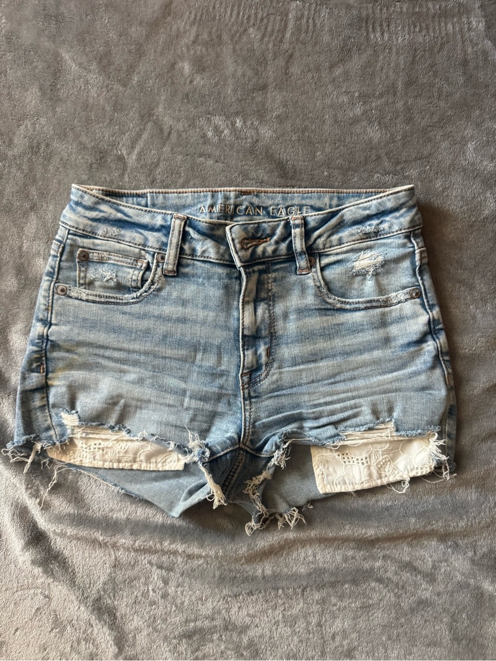 American Eagle Outfitters Light Wash Lace-Inset Denim Cutoff Shorts